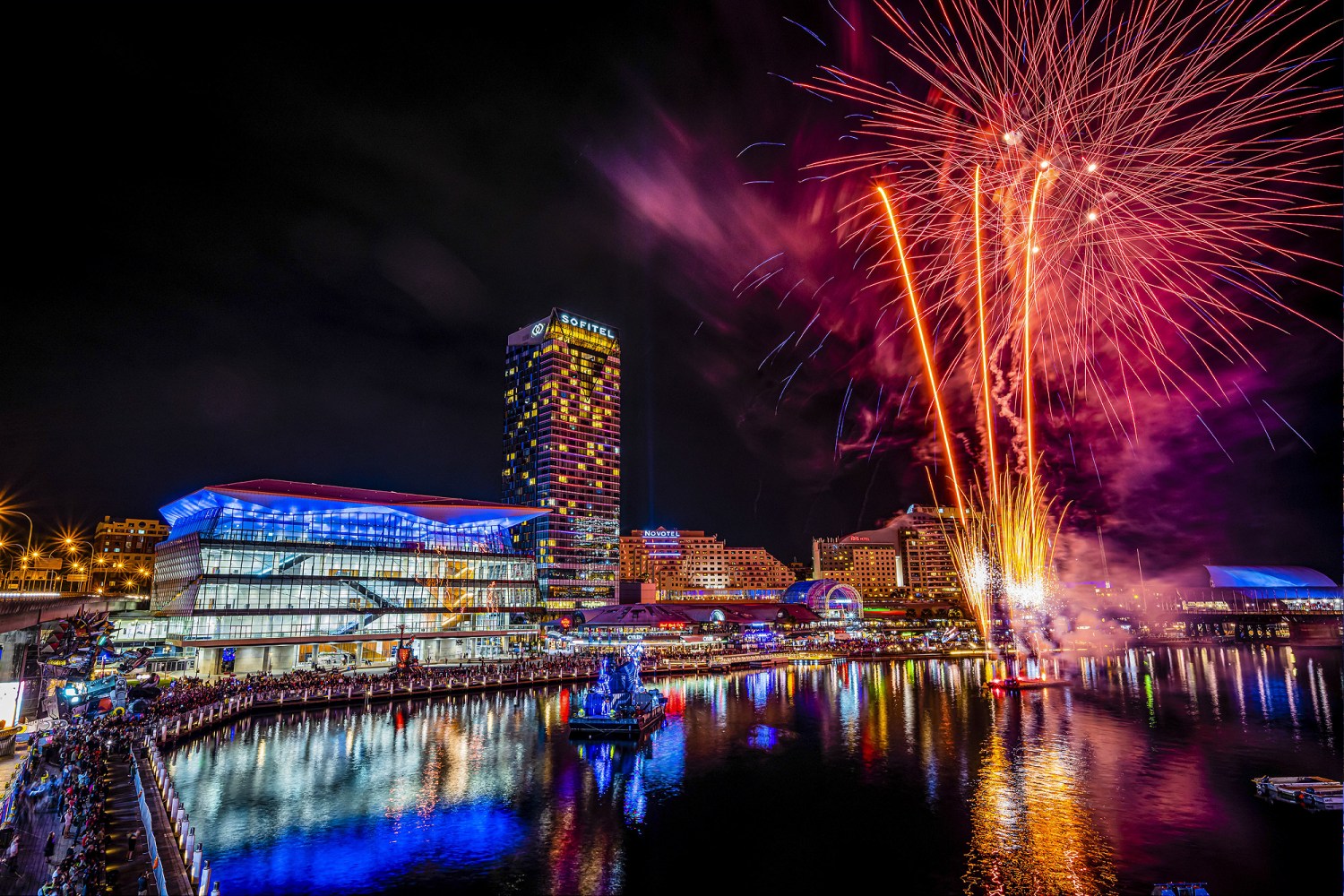 a group of fireworks in the night sky